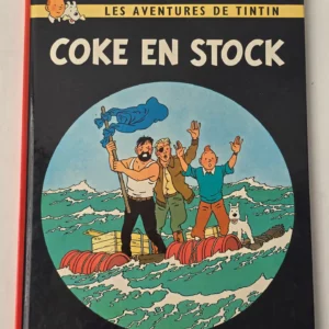 Couverture de Tintin Coke en stock, édition Casterman vintage, avec Tintin, Haddock et Milou sur un radeau en pleine mer.