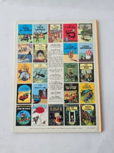 Dos 22 titres de l’édition Casterman mai 1982 de Les 7 Boules de Cristal, présentant la liste des albums Tintin et les séries associées.