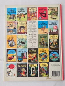 Quatrième de couverture Tintin en Amérique Casterman 1984 ISBN 220300102X dos rouge