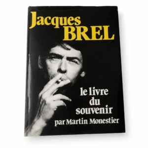 Couverture de « Brel — Le livre du souvenir » par Martin Monestier, portrait noir et blanc de Jacques Brel, titre et auteur visibles.