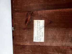 Étiquette indiquant l’auteur Ilarion Ioan Mureșanu et l’adresse du monastère de Nicula