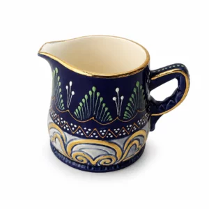Crémier HB Quimper peint à la main, décor bleu profond, rehauts dorés, dessous marqué HB 533 Pi